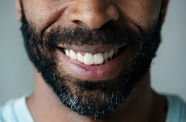 smiling bearded man